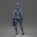 Trendy City Girl Carrying Handbag While Rocking Casual Winter Look
