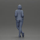 Confident woman leaning slightly with her hands in pockets - Only-Games