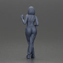 Woman with black hair wearing blue overalls holding a drink - Only-Games