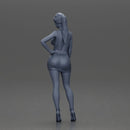 Woman in silver mini dress posing with hand on hip - Only-Games