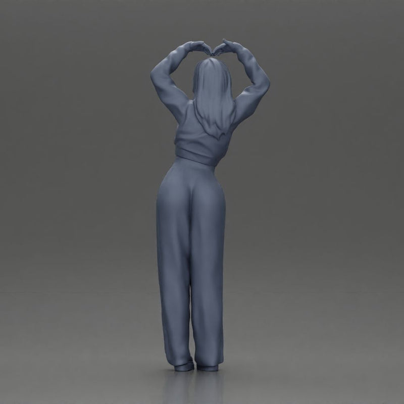 Confident woman striking a heart-shaped pose with joyful energy - Only-Games