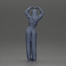 Confident woman striking a heart-shaped pose with joyful energy - Only-Games