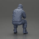 Gangster sitting in thought dressed casually with a beanie and jacket - Only-Games