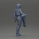 Woman in Headphones Lifting Leg in Stylish Streetwear - Only-Games