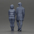 Couple in winter outfits stands by car, calm and stylish. - Only-Games