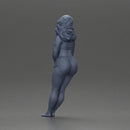 Woman in yellow top and red shorts leaning to wall - Only-Games