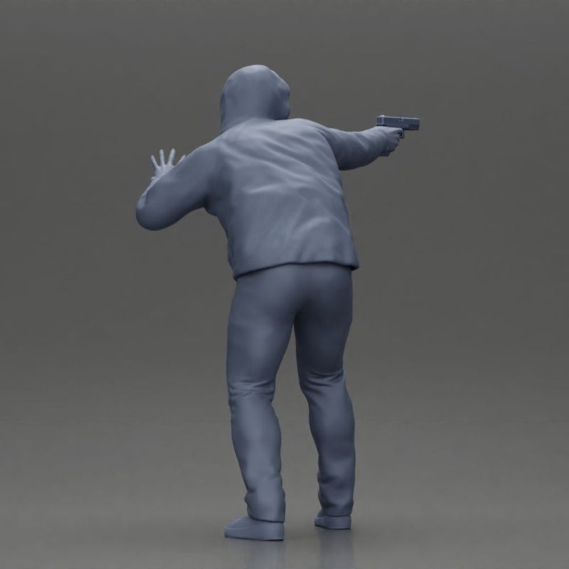 Man in hoodie pointing gun while raising hand in defensive gesture - Only-Games