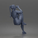 Relaxed Morning Drinker Sitting Casually in Comfy Outfit and Sneakers