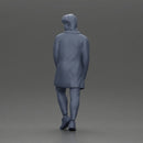 Man in brown coat glances sideways dressed in stylish winterwear - Only-Games