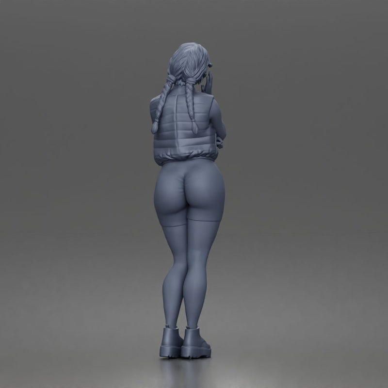 Thoughtful woman stands hand on cheek wearing vest shorts boots - Only-Games