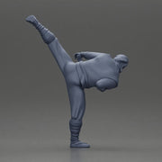 Ninja in black uniform performs high side kick with precision - Only-Games