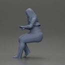 Blonde woman in red top white pants sitting applies hand cream - Only-Games