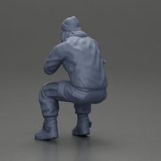 Gangster sitting in thought dressed casually with a beanie and jacket - Only-Games