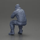 Gangster sitting in thought dressed casually with a beanie and jacket - Only-Games