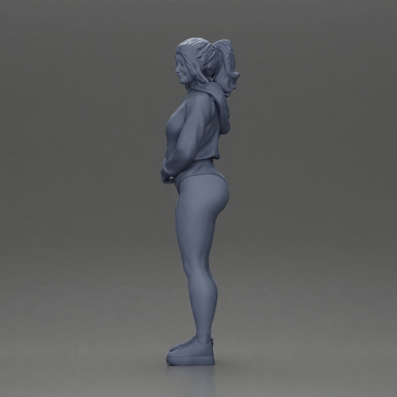 attractive woman in purple hoodie and bikini strikes a pose with style - Only-Games
