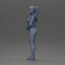 attractive woman in purple hoodie and bikini strikes a pose with style - Only-Games