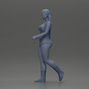 woman walking with purpose wearing red top white shorts brown boots - Only-Games