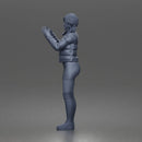 woman In Puffer Jacket With Mini Skirt Thigh-Highs And Boots