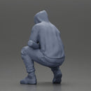 Gangster crouching low in green hoodie holding bat planning move - Only-Games