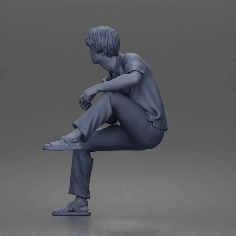 Man Sitting With Knee Bent In Shirt Trousers And Sandals