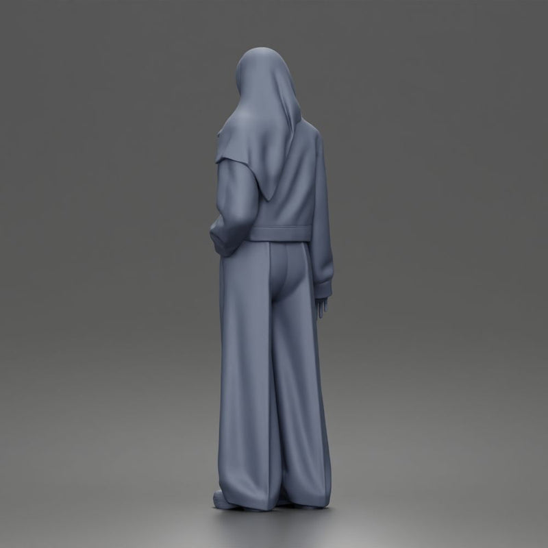 Relaxed Hijab Stander Posing in Jacket Shirt Pants and Sneakers