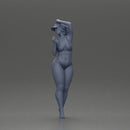 Stylish woman confidently posing in red bikini and white cap - Only-Games