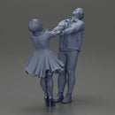 Couple leaning back holding hands enjoying a playful dance moment - Only-Games