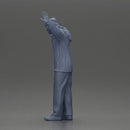 Man wearing hoodie and beanie raises hands looking happy in relaxed stance - Only-Games