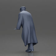 Man in black coat wearing flat cap standing with serious expression - Only-Games