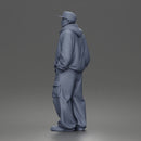 Relaxed Hooded Cap Poser Standing in Cargo Pants and Sneakers