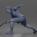 Focused Tennis Player Lunging Forward in Athletic Shirt, Shorts, and Sneakers