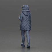 Woman walks sipping takeout drink wearing parka sweater leggings sneakers - Only-Games