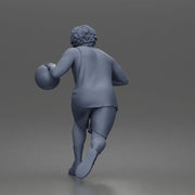 Basketball player drives forward dribbling ball wearing sleeveless jersey shorts socks sneakers - Only-Games