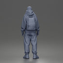 Chill Hooded Cap Walker Posing with Backpack Pants and Sneakers
