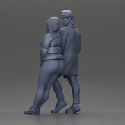 Couple in winter outfits stands by car, calm and stylish. - Only-Games