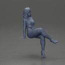 Stylish woman sitting confidently in red top yellow pants heels - Only-Games