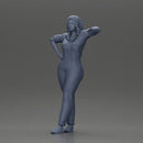 woman in jumpsuit leaning pointing forward ready for action - Only-Games