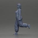 Strong woman power walking with dumbbells wearing white top and red pants - Only-Games