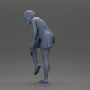 Woman in white towel lifting leg while putting on red underwear - Only-Games