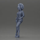 Stylish woman posing confidently with voluminous hair and trendy outfit - Only-Games