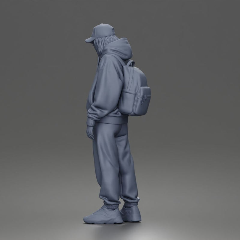 Chill Hooded Cap Walker Posing with Backpack Pants and Sneakers