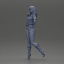 Confident and Stylish Woman in Chic Summer Outfit Posing Playfully - Only-Games