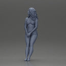 Woman in yellow top and red shorts leaning to wall - Only-Games