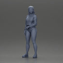 attractive woman in purple hoodie and bikini strikes a pose with style - Only-Games