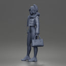 Trendy City Girl Carrying Handbag While Rocking Casual Winter Look