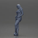 Stylish woman in red blazer dress and boots posing with crossed legs - Only-Games