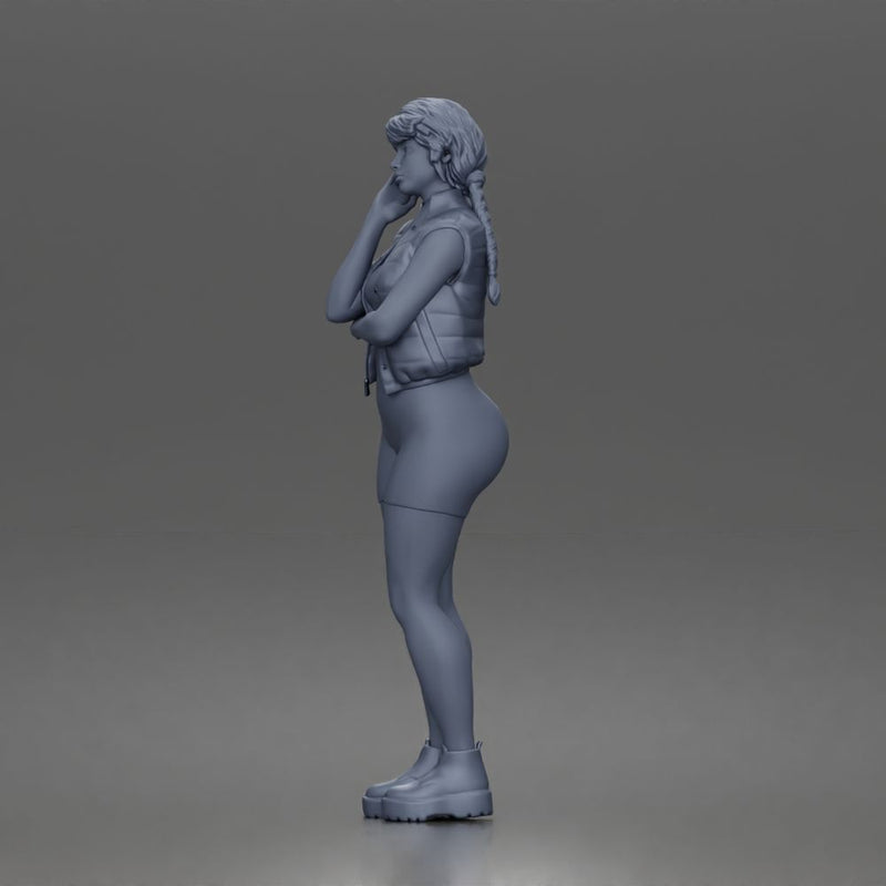 Thoughtful woman stands hand on cheek wearing vest shorts boots - Only-Games