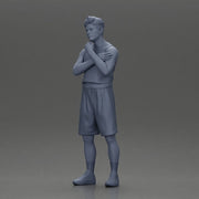 Thoughtful man stands in athletic gear pondering ideas with calm steady focus - Only-Games