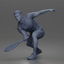 Focused Tennis Player Lunging Forward in Athletic Shirt, Shorts, and Sneakers