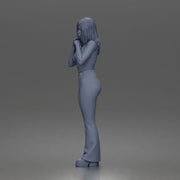 Thoughtful woman stands daydreaming wearing crop tank top and trousers - Only-Games